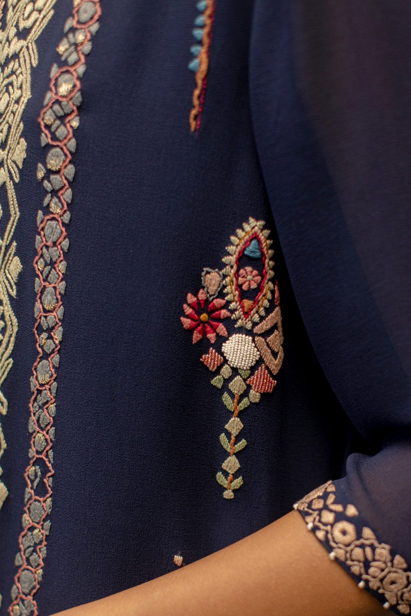 Dark indigo embroidered kurta set designed by Divyam Mehta at AASHNI+CO.