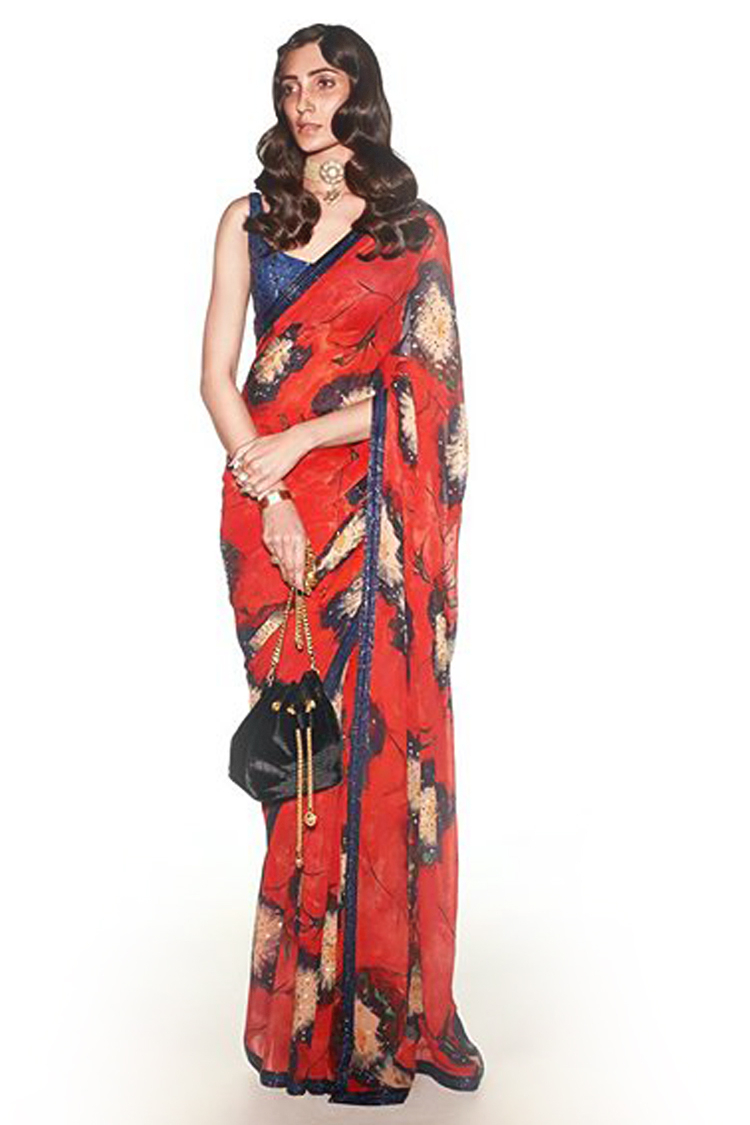 Red cocktail sari by Sabyasachi at ...